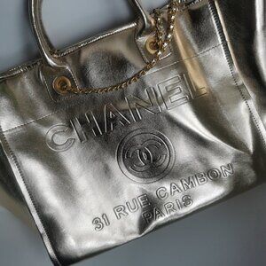 Metallic gold Chanel oversized leather tote